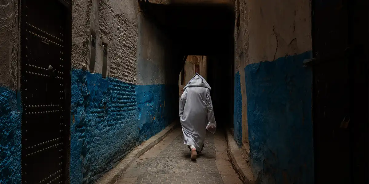 Fez medina alley with traditional Moroccan architecture