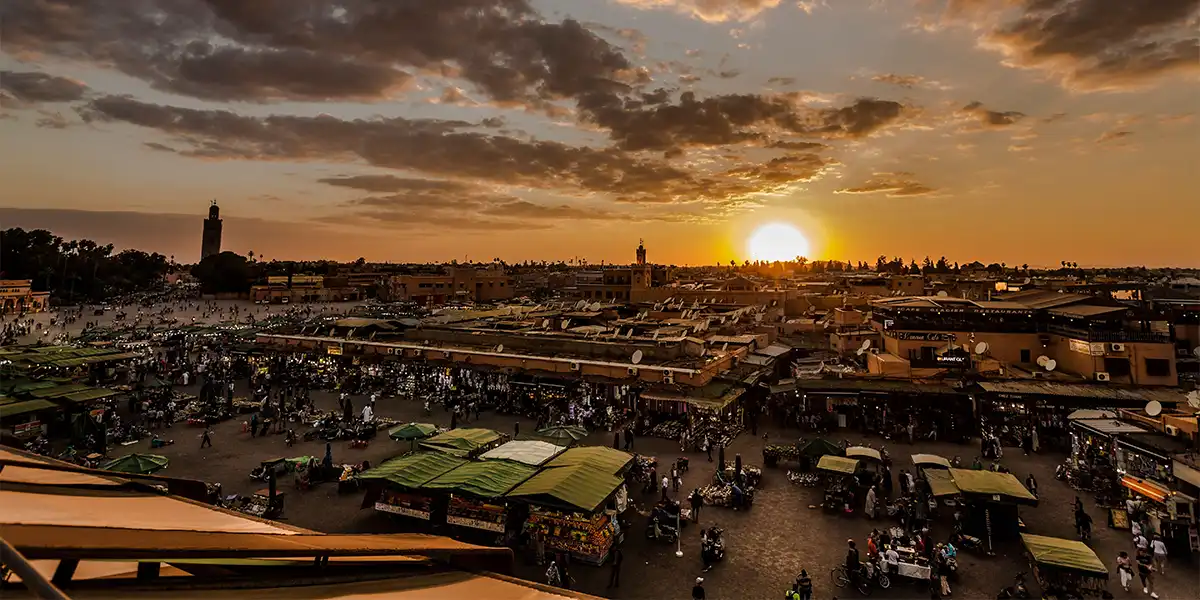 Marrakech medina rooftops at sunset with traditional Moroccan architecture